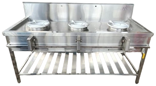 Layaan three-well gas cooking range with lidded sunken pots, a rear splashback and a slatted undershelf