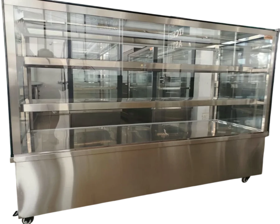 Layaan glass display showcase with three tiers of glass shelves over a stainless plinth, glazed on all sides and mounted on castors